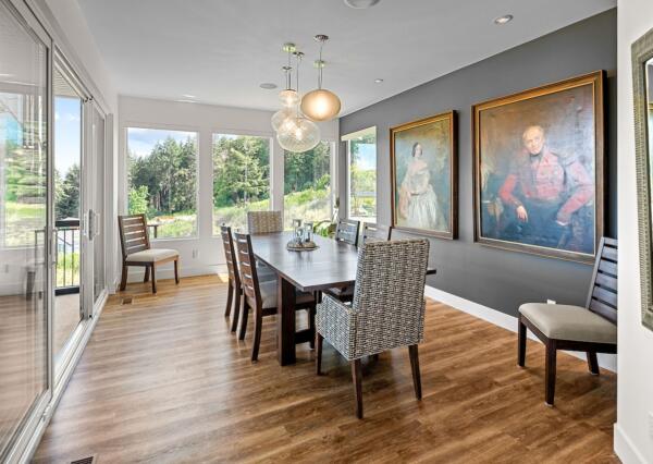 Large dining room with natural light in custom home build