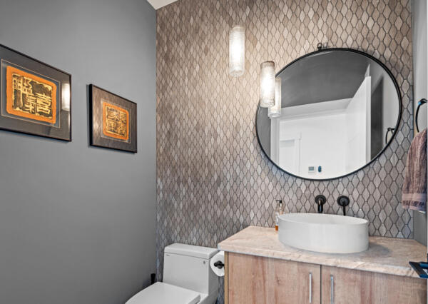 Contemporary bathroom with tile and light wood vanity