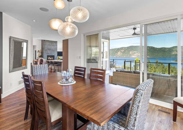 Dining room with large glass sliding doors to covered patio