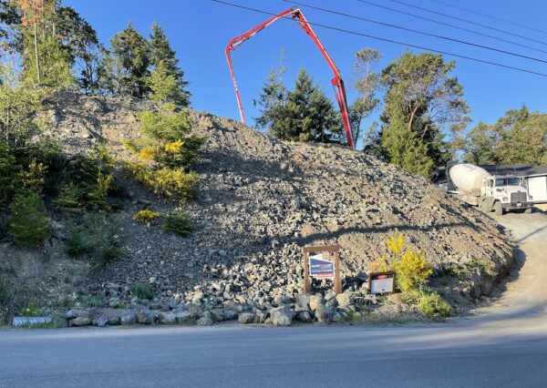 Hilltop excavation and concrete pour in Shawnigan Lake