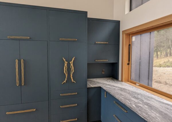 Tilt windows in custom design kitchen with blue cabinetry