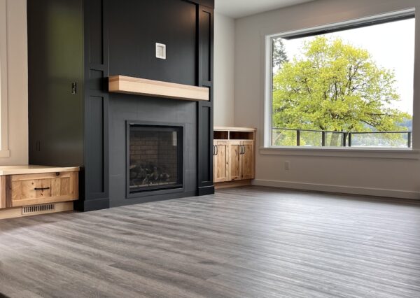 Black fireplace surround with floating wood mantle