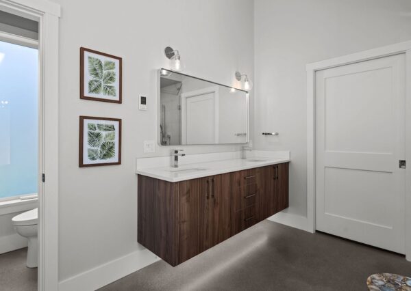 Floating double vanity in primary bedroom