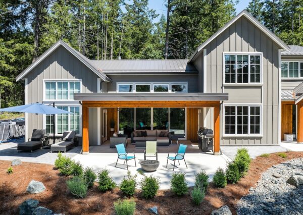 Covered outdoor living space with room for a hot tub