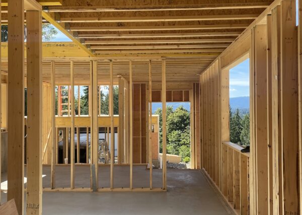 Framed walls and windows in custom design home