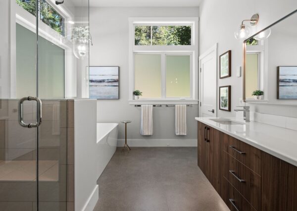 Master bathroom with floating vanity and concrete heated flooring