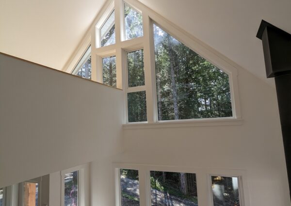 A-frame cabin with lots of windows